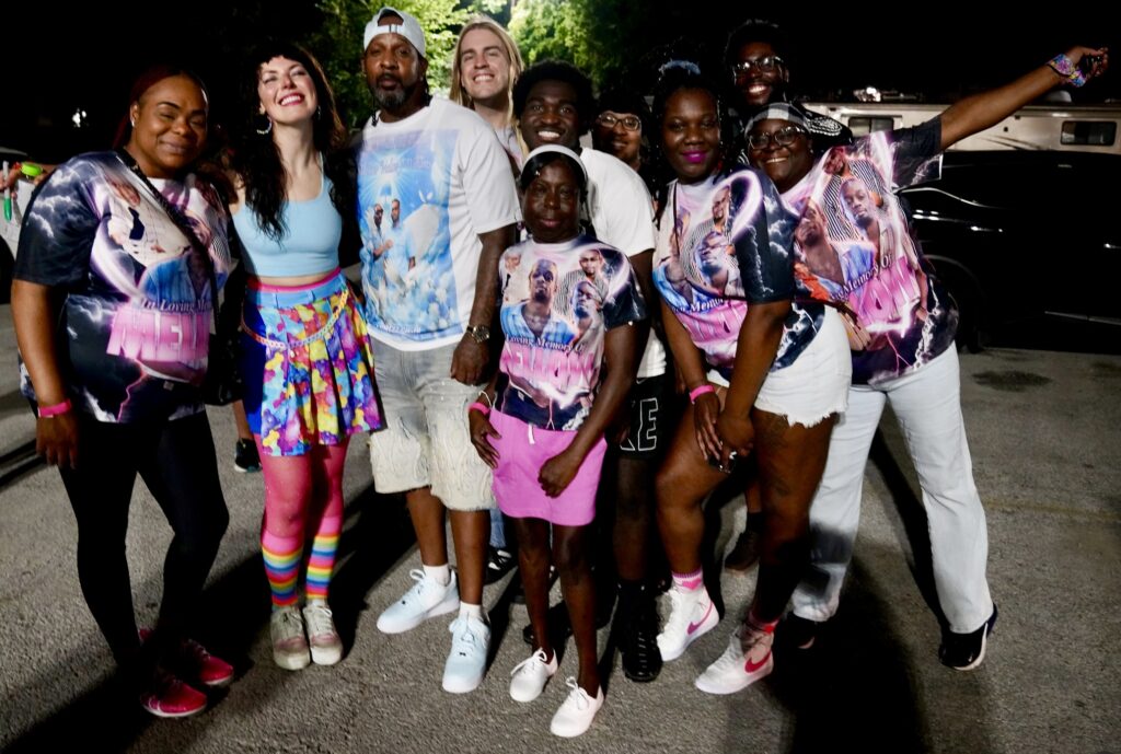 Sleigh Bells’ Alexis Krauss is flanked by RoMellow Williams’ mother and father, Tashia Williams and Mario Hall, after Sleigh Bells’ concert at Dallas’ Granada Theater on May 24, 2025. Photo by Erin Nicole Parisi