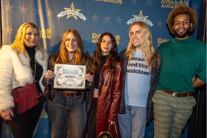 January 29, 2025 — RoMellow Williams (in green) and Ian Saint (in blue) pose at the Dallas Entertainment Awards with Best Record Label winners State Fair Records inside Deep Ellum’s Studio At the Bomb Factory. Photo by Maddy Ullman